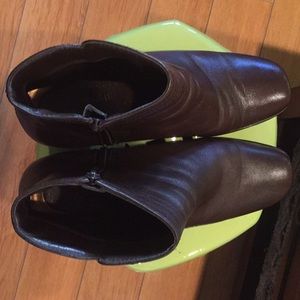 Women ankle boot in dark brown color